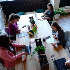 women working in a co-working space