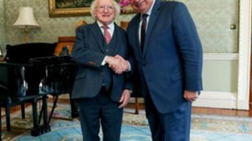 President Michael D. Higgins greets Gérard Larcher, president of the Senate of France, at Aras an Uachtarain