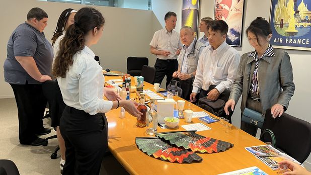 Students displaying rums