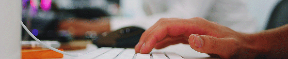 hand typing on keyboard generic image